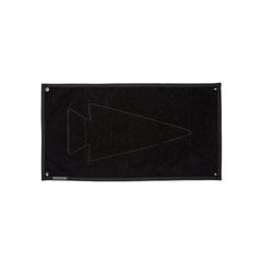 The GORUCK Spearhead Patch Board is a black, rectangular mat made from durable 1000D Cordura and showcases a subtle arrowhead design. It includes grommets at each corner and features an integrated velcro panel for easy customization.