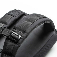Close-up of GORUCK black rucksack shoulder straps with heavy-duty webbing and buckle