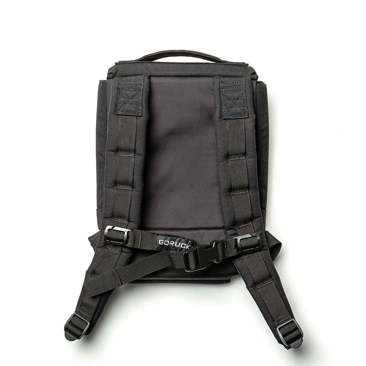 GORUCK black rucksack back view with padded straps and durable build on white background