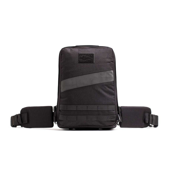 The GORUCK Rucker 4.0 is a black tactical rucksack with waist straps and multiple compartments, perfect for rucking workouts with Ruck Plates. Shown on a white background.