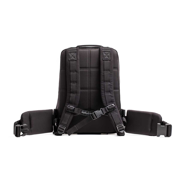 The GORUCK Rucker 4.0, shown from the back with padded straps and a waist belt, is ideal for carrying your rucking gear and is pictured on a white background.