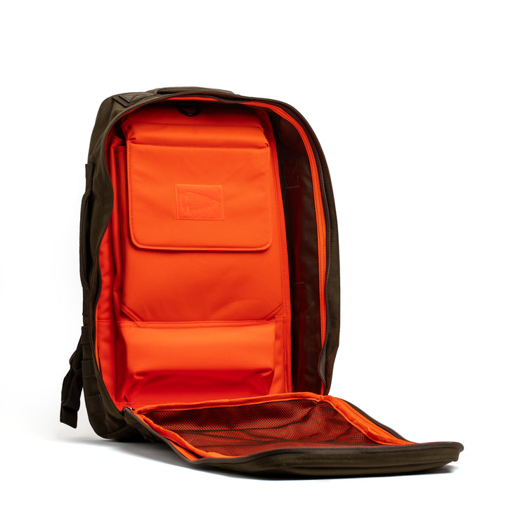 The GORUCK Rucker 4.0 fitness rucksack features a bright orange interior, padded compartments, and a mesh pocket—ideal for organized training or as your reliable rucking backpack.