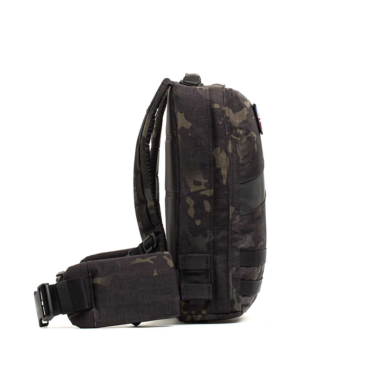 GORUCK Rucker 4.0 15L backpack in black multicam with orange detail, side view