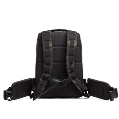 GORUCK Rucker 4.0 15L backpack in black Multicam with orange accents, padded straps, and hip belt