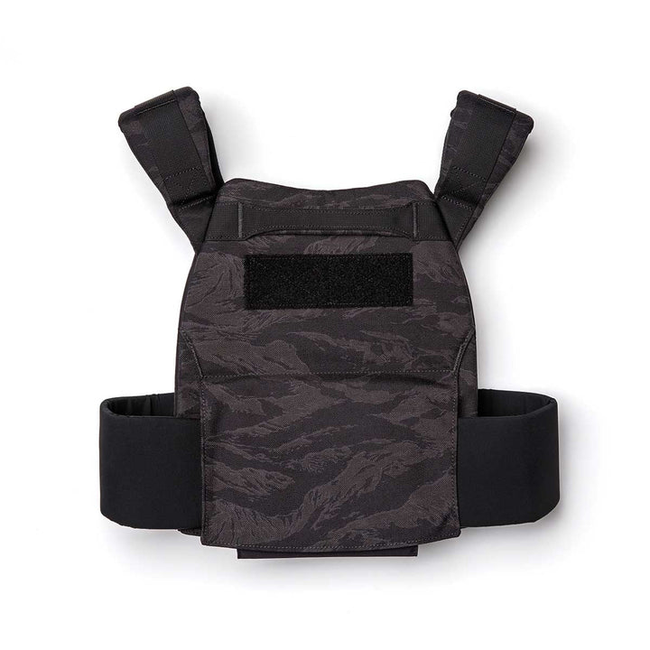 The Rucking Weight Vest features wide shoulder straps and a camouflage design, compatible with Curved Ruck Plates—ideal for rucking workouts. Shown against a white background.