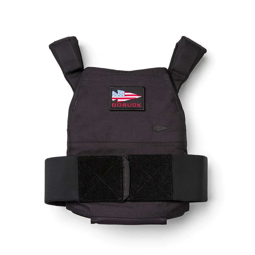 The Rucking Weight Vest features Velcro straps, a patch with a U.S. flag and "GORUCK," ideal for rucking and compatible with Curved Ruck Plates.