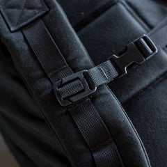 A close-up view of the GORUCK Training Sternum Strap highlights its durable strap and buckle, featuring MOLLE webbing for added gear attachment.