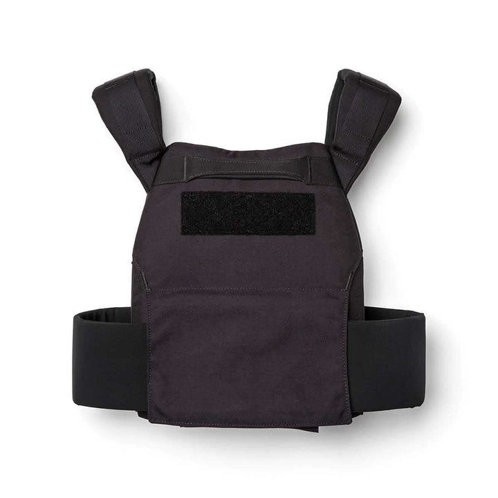 The Rucking Weight Vest is a black tactical vest with adjustable shoulder and waist straps, designed for rucking and compatible with Curved Ruck Plates, shown on a white background.