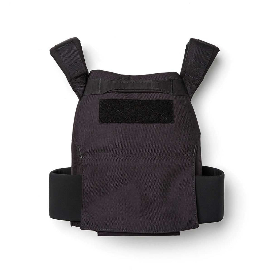 The Rucking Weight Vest features shoulder straps and adjustable side panels, designed for rucking or use with Curved Ruck Plates, shown in black on a white background.