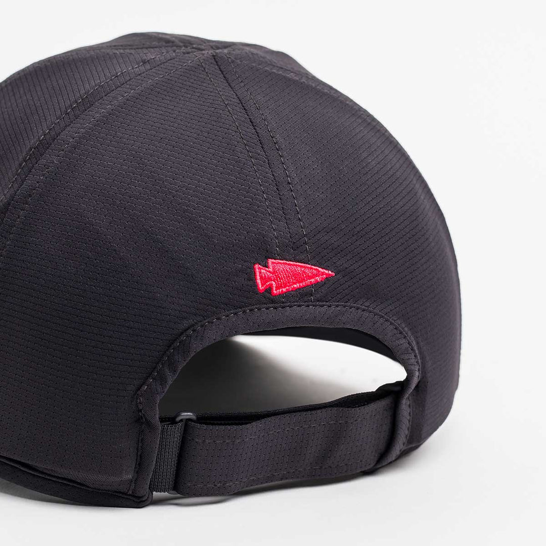 Back view of the GORUCK Performance Running Hat - ToughMesh in black, featuring a small red arrowhead logo above the adjustable strap.
