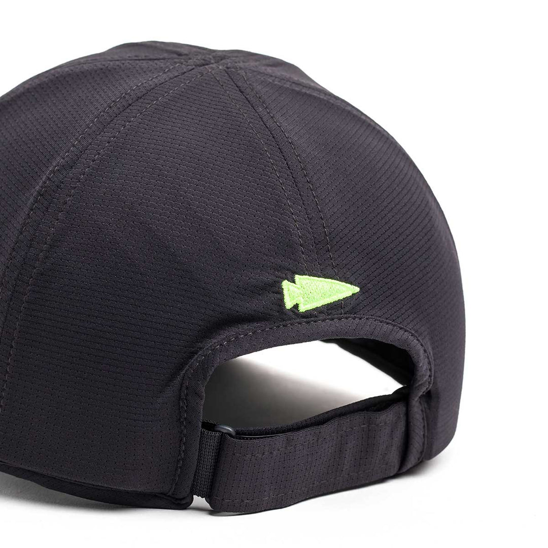 Close-up of the back of the GORUCK Performance Running Hat - ToughMesh, showing a black cap with a yellow-green arrow logo and a premium adjustable strap.