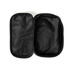 The GORUCK Shadow Pockets, shown empty and open on a white background, are black Cordura zippered pouches ideal for organizing your gear.