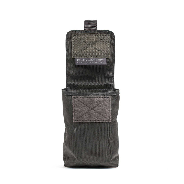 The GORUCK Simple Side Pocket is a black tactical pouch with an open flap, MOLLE webbing, and a Velcro front patch—ideal for upright ruck organization.