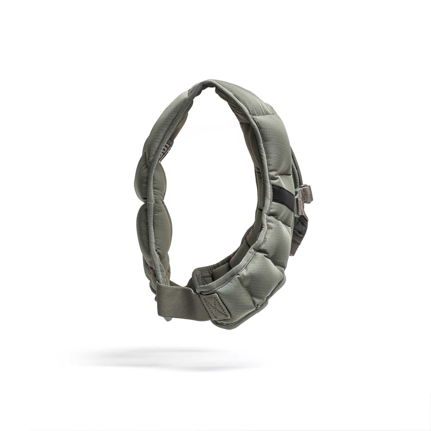 Grey padded adjustable strap with buckle, designed for the Spy Ruck | Women's Weighted Vest by GORUCK, floats against a plain white background.