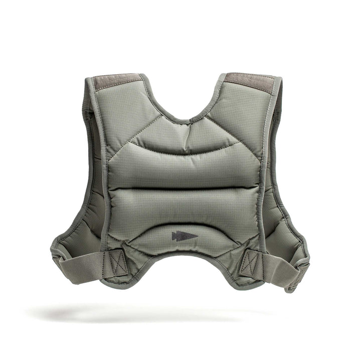 The GORUCK Spy Ruck Women's Weighted Vest is gray, padded, with shoulder straps and a front velcro closure, shown isolated on a white background.