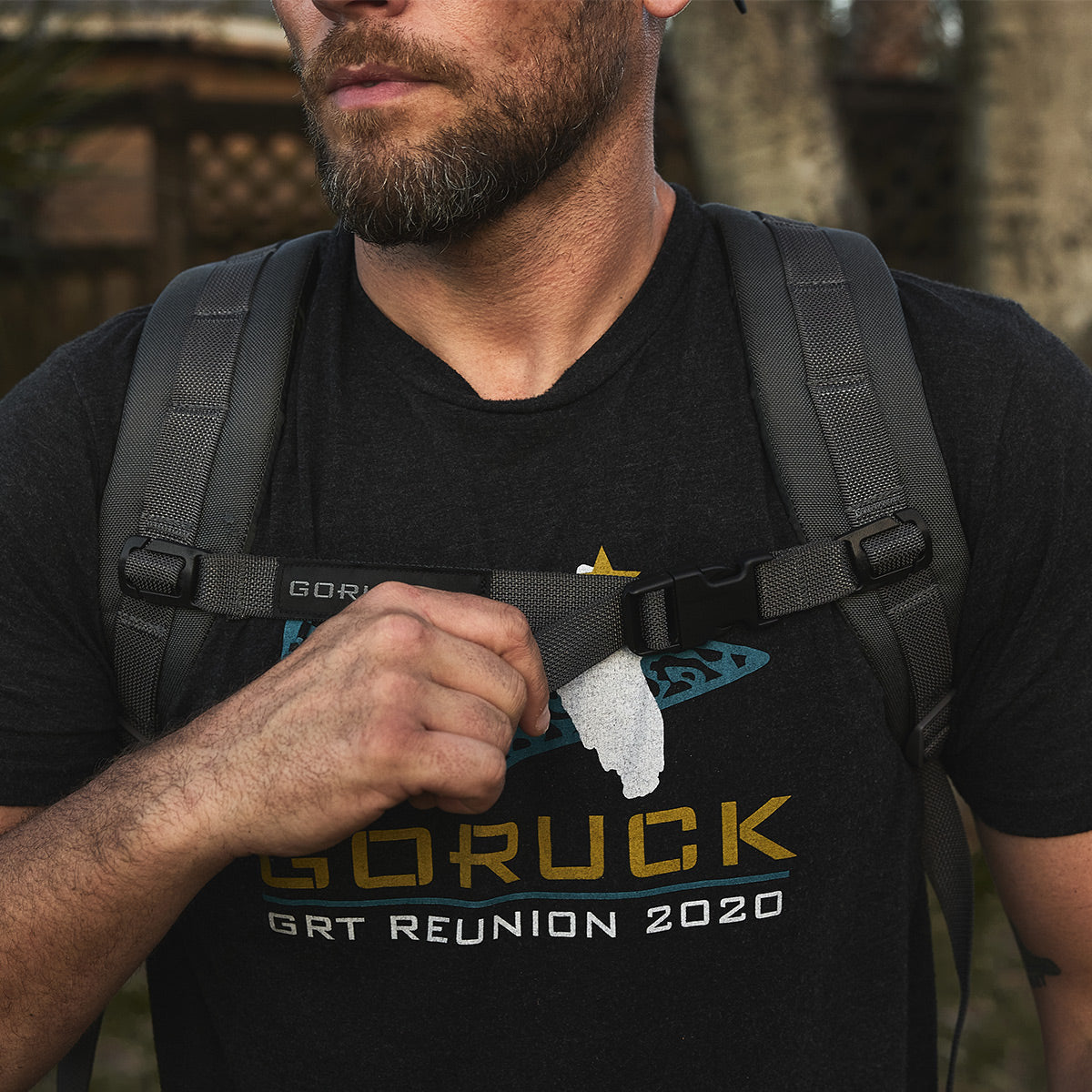 Man outdoors in a black 