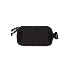 GORUCK black sternum strap pouch with dual zippers and buckle on white background
