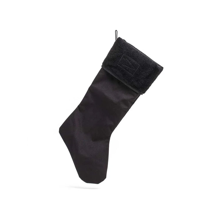 GORUCK black tactical holiday stocking with reinforced cuff on white background