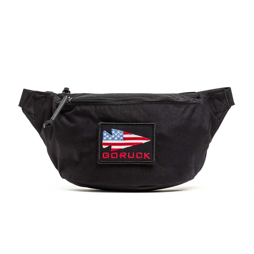 GORUCK black tactical fanny pack with American flag patch and zippered front pocket