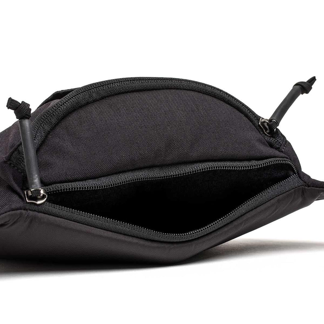 GORUCK black tactical fanny pack with open main zipper compartment, rugged durable fabric