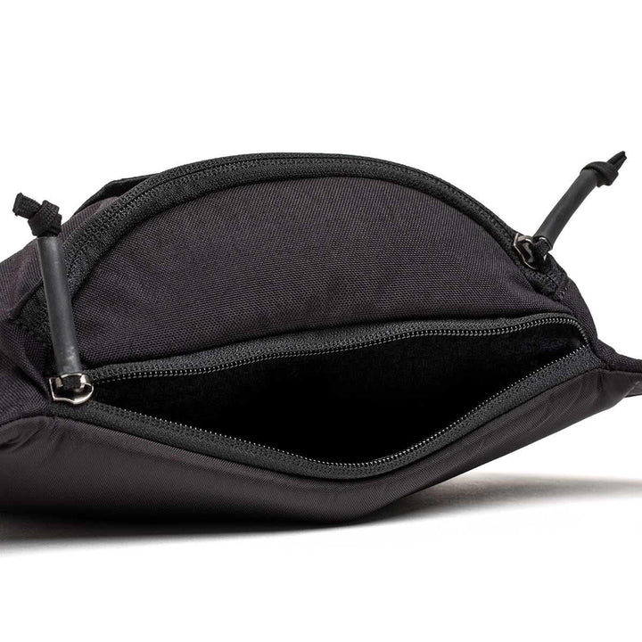 GORUCK black tactical fanny pack with open main zipper compartment, rugged durable fabric
