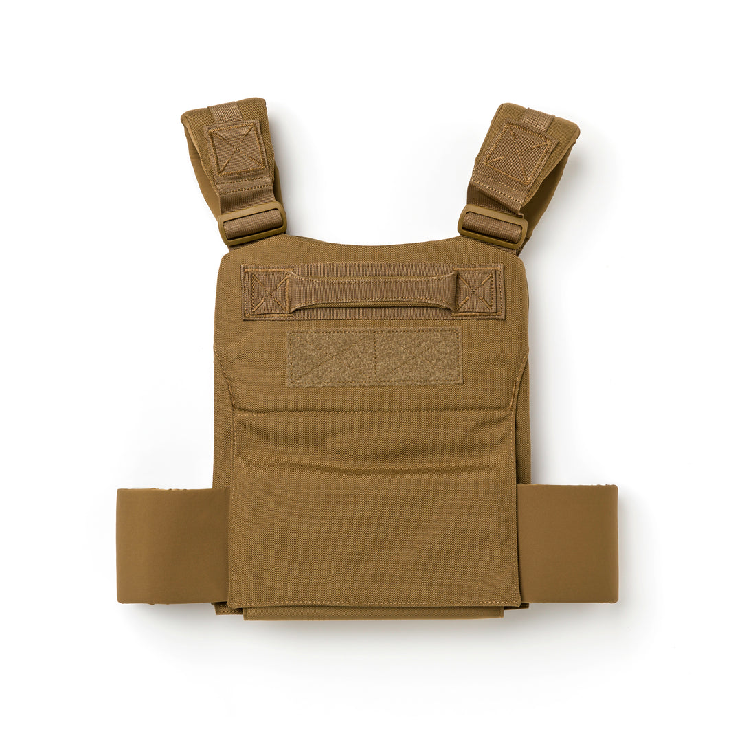 The GORUCK Training Weight Vest 2.0, shown with shoulder straps and a front panel against a white background, is perfect for workouts and fitness routines.