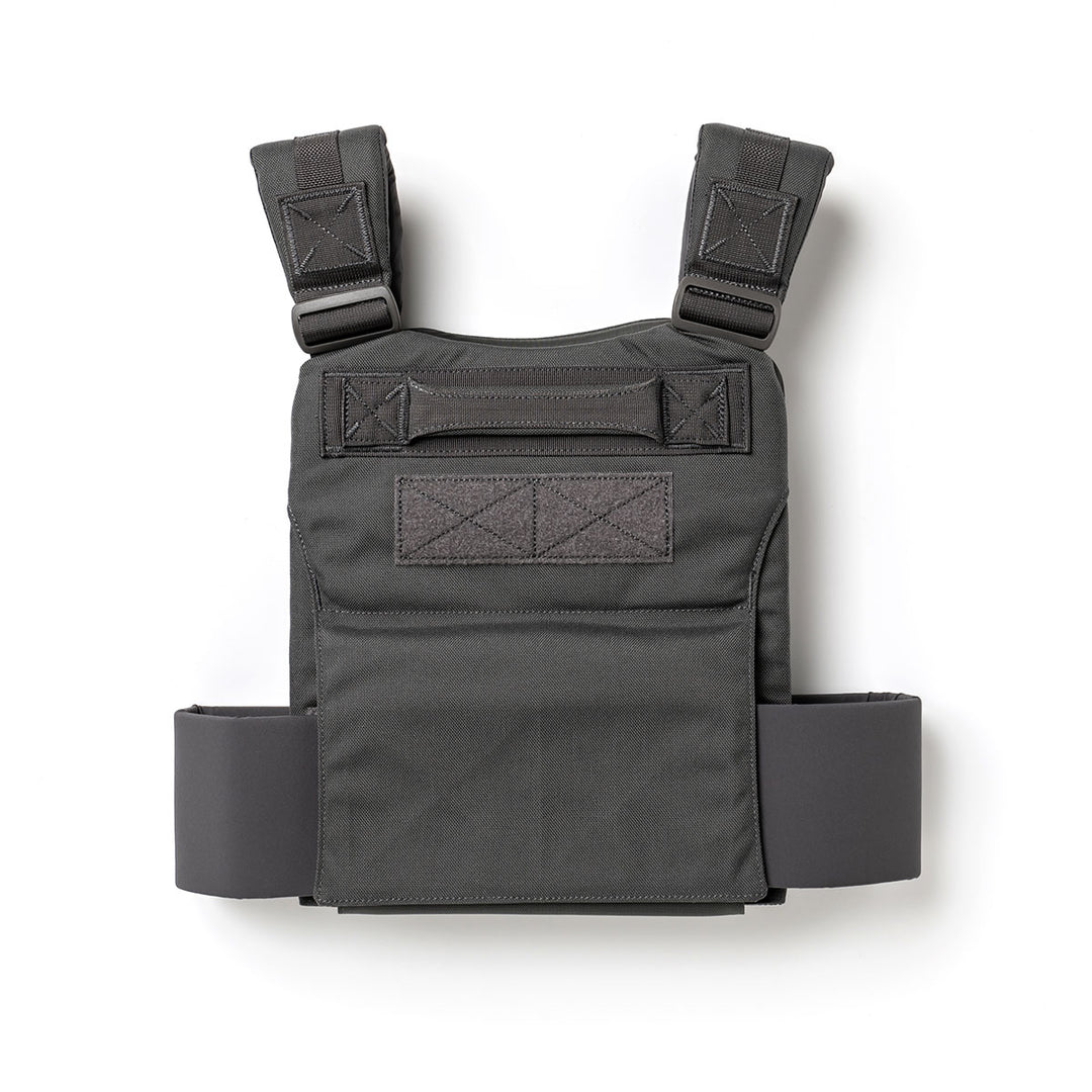 The GORUCK Training Weight Vest 2.0, shown on a white background, features adjustable shoulder straps and side bands for a customizable fit. Designed for intense workouts or tactical use, this black vest offers exceptional durability and comfort.