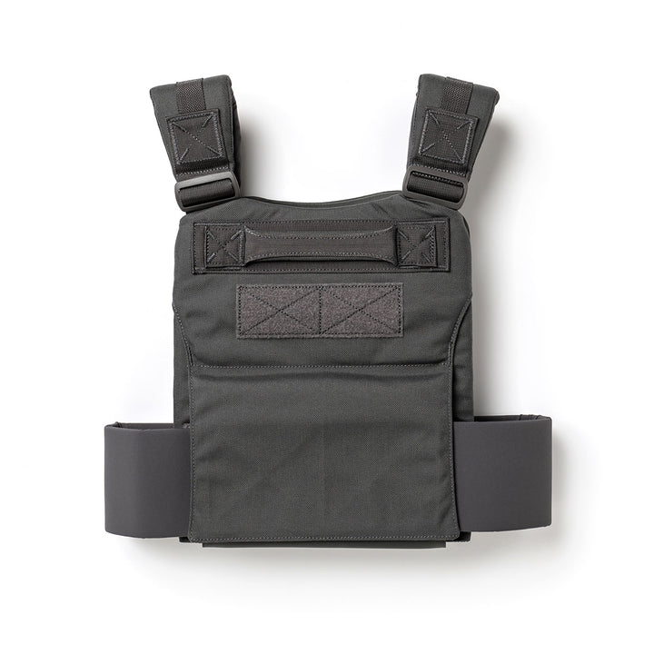 The GORUCK Training Weight Vest 2.0, shown on a white background, features adjustable shoulder straps and side bands for a customizable fit. Designed for intense workouts or tactical use, this black vest offers exceptional durability and comfort.