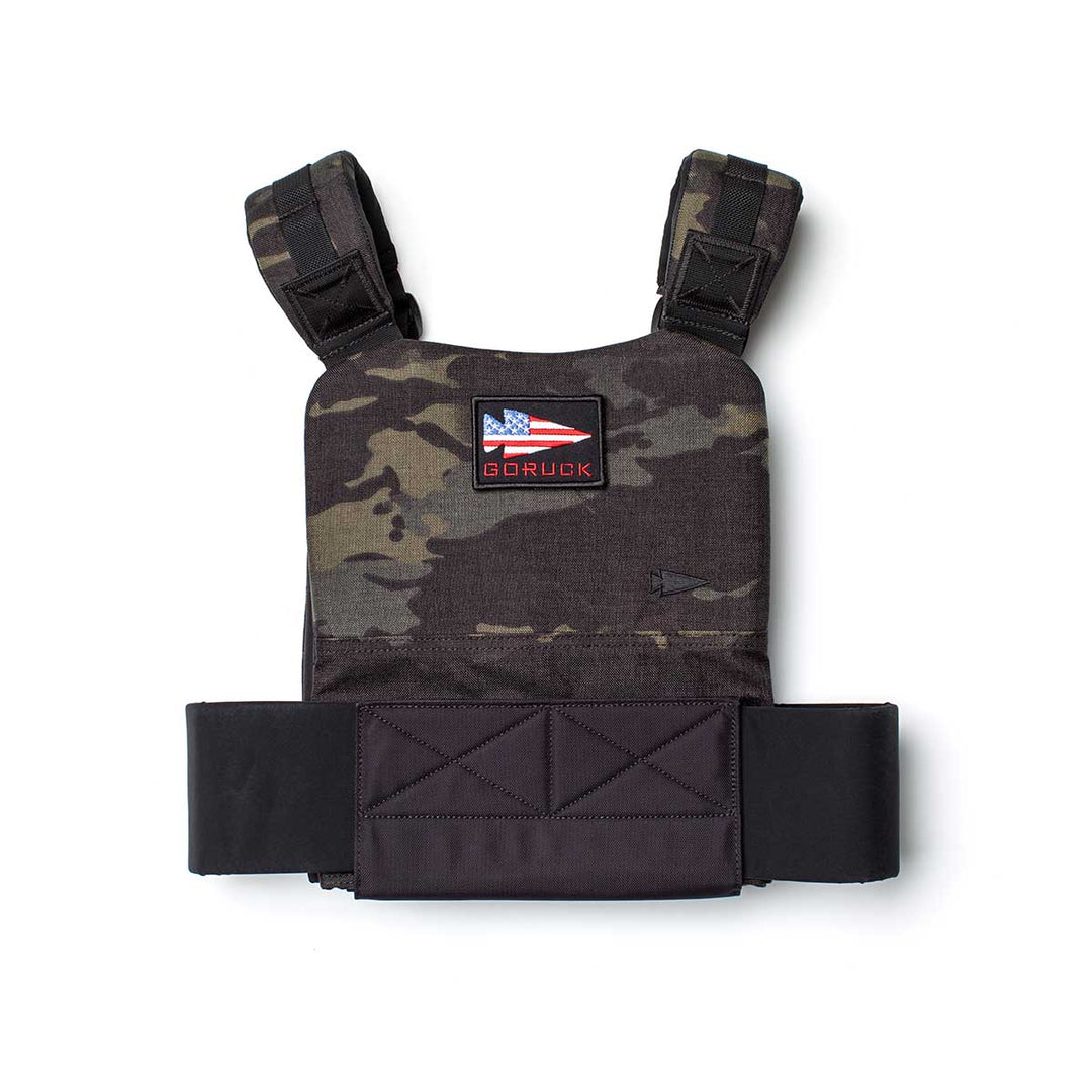 The GORUCK Training Weight Vest 2.0 in black and camouflage features an American flag patch, "GORUCK" on the front, and adjustable straps—perfect for your toughest workouts.