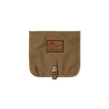 The GORUCK Wire Dopp is a brown pouch with a flap, buckle closure, and front spear logo patch—ideal for organizing your travel essentials or EDC gear.