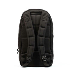 The GORUCK Bullet Ruck Laptop - Ballistic Nylon Cordura is shown from the back, featuring padded shoulder straps and quilted padding—a durable daypack with a bombproof laptop compartment for secure everyday carry.