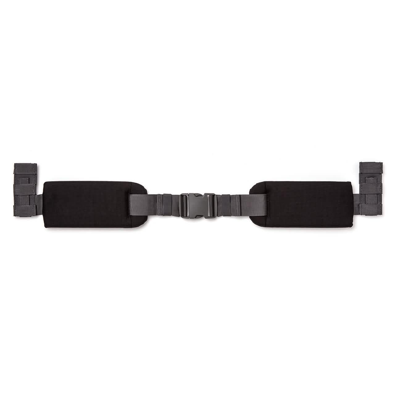 Introducing the GORUCK Padded Hip Belt: a black belt featuring adjustable straps, padded sections on each side, and a central buckle. It’s perfect for hip carrying or securing heavy loads comfortably.