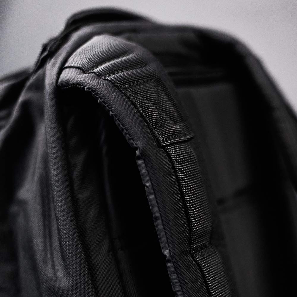 A close up of a black backpack.