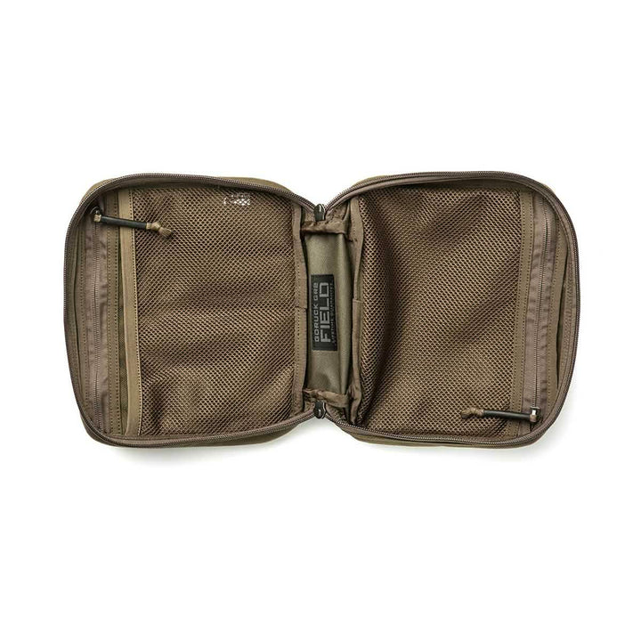 The GORUCK GR2 Field Pocket is an open brown Cordura pouch with mesh pockets on both sides, shown lying flat on a white background—perfect for organizing electronics.