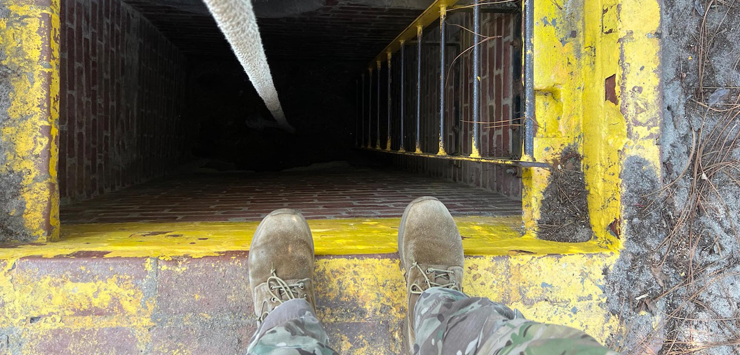 A person standing on a yellow ladder.
