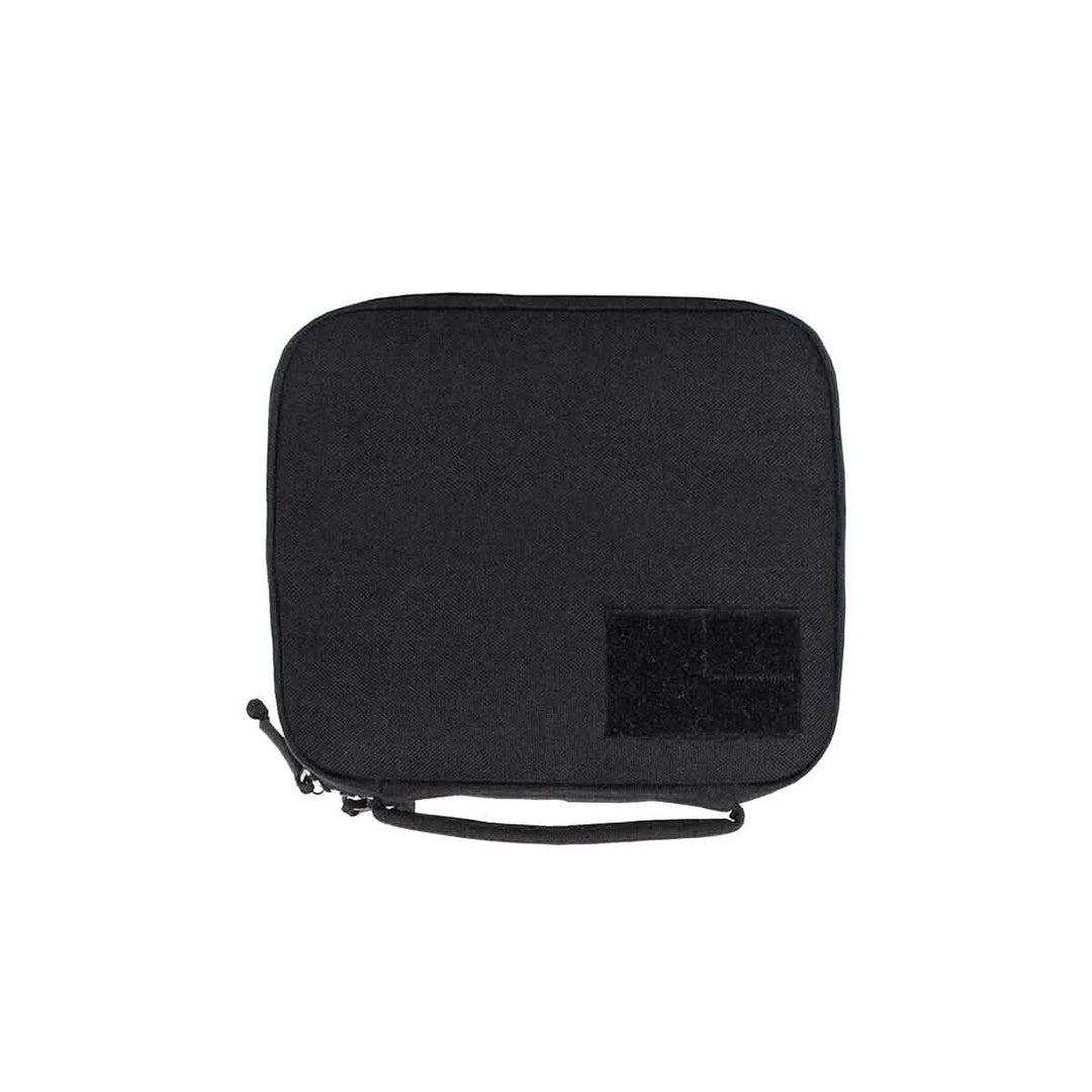 The GORUCK GR2 Field Pocket is a black rectangular dopp kit made from durable 1000D Cordura, featuring a zippered closure, convenient carrying handle, and a small patch on the lower right corner.