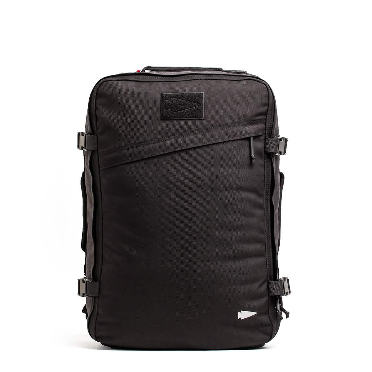 The GORUCK GR3 - Cordura is a black travel backpack with side buckles, top handle, slanted front zipper pocket, and waterproof zippers, designed as a carry-on rucksack. Shown on a white background.