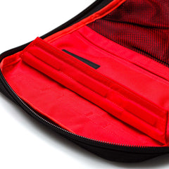 Close-up of an open Rucker 5.0 in red and black, highlighting multiple interior pockets and compartments—ideal for organizing your rucking essentials.