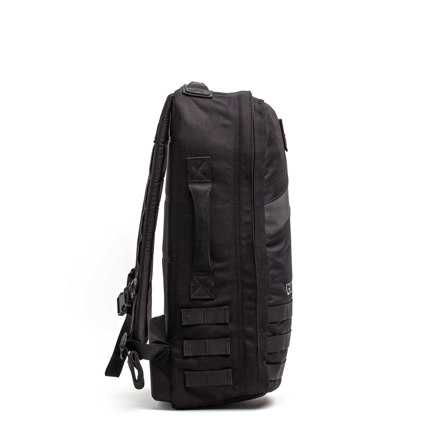 The Rucker 5.0, shown from the side against a white background, features multiple straps and a top handle—ideal for rucking or everyday use.